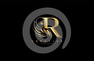 Initial R letter luxury beauty flourishes ornament golden monogram logo