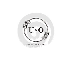 initial UO letters hand drawn feminine and floral botanical logo suitable for spa salon skin hair beauty boutique and cosmetic