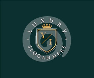 Initial YI Letter Royal Luxury Logo template in vector art for Restaurant, Royalty, Boutique, Cafe, Hotel, Heraldic, Jewelry,