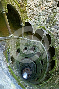 Looking down the Initiation well of Quinta da Regaleira in Sintra, Portugal. photo