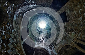 The Initiation Wells (Inverted tower) in Quinta da Regaleira estate. Sintra. Portugal photo