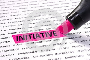 Initiative word highlighted with marker on paper photo