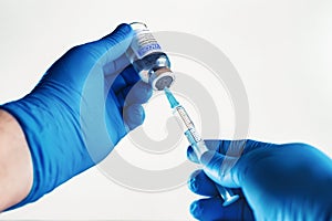 Injecting dose of generic vaccine in syringe for infections prevention in white background