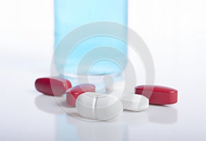 Injection ampule with pills show medicine concept