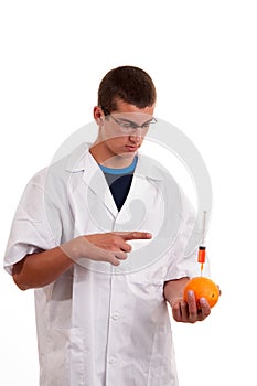 Injection into fruits. Genetically modified fruit