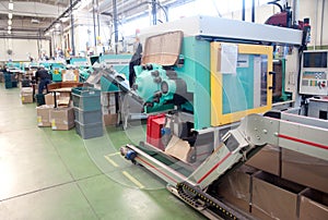 Injection molding machines in a large factory