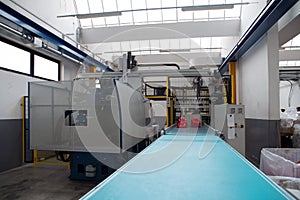 Injection molding machines in a large factory