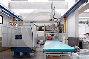 Injection molding machines in a large factory