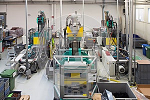 Injection molding machines in a large factory