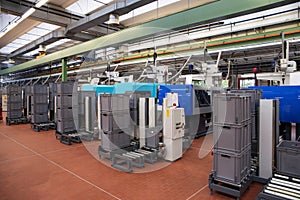 Injection molding machines in a large factory