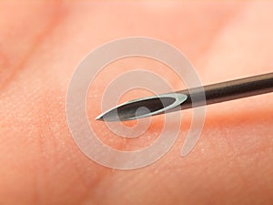 Injection needle on skin