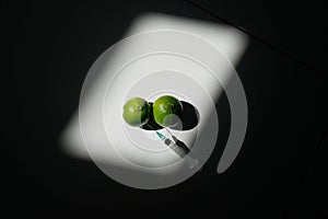 Injection of suspicious substances with a syringe into two limes