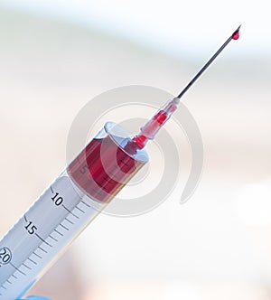 Injection syringe with blood