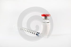 Injection vial and disposable syringe