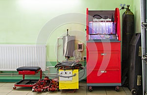 Injector repairing machine in car service station photo