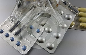 Injectors and pills-tablets