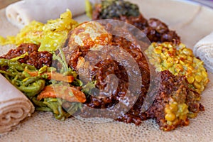 Injera with an assortment of toppings