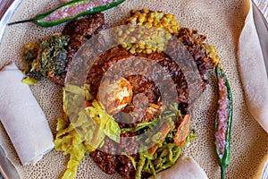 Injera with an assortment of toppings