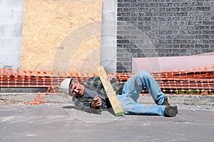 Injured construction worker at work site