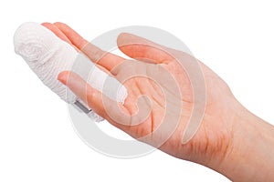 Injured finger with bandage isolated on white background