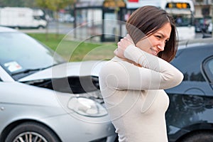 Injured girl after car accident in the street