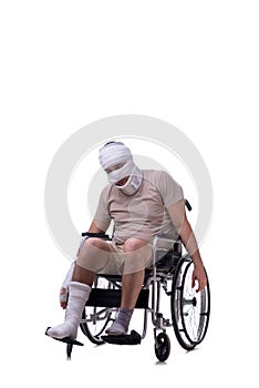 Injured man in wheel-chair isolated on white