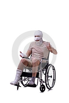 Injured man in wheel-chair isolated on white