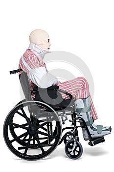 Injured man in a wheelchair side view