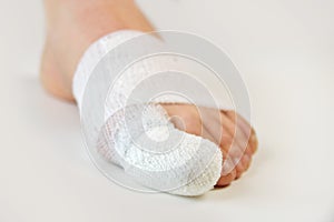 Injured toe with bandages photo