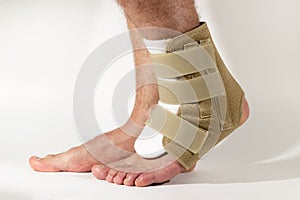 Injury of leg, sprain of ligaments. Bandage on the foot. The con