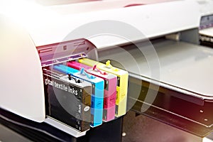 Ink cartridges in printer for textile