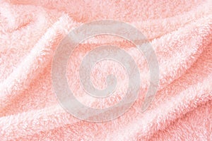 ink delicate soft background of fur plush smooth fabric. Texture of peach soft fleecy blanket textile. Girly wallpaper