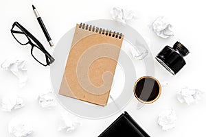 Ink, dip pen, notebook, coffee, glasses for writer workplace set on white office background top view mock-up