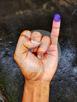 Ink marks on the tip of the little finger as proof of having participated in the election photo