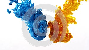 Ink swirling in water, Color drop in water photographed in motion