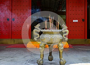 Inlaid dragon incense burner in the temple