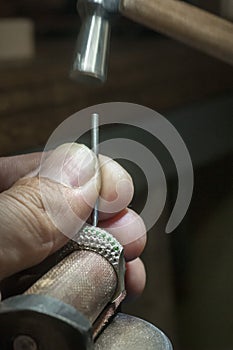 Inlaying Gemstone on the Ring photo