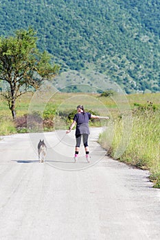 Inline skating with dog