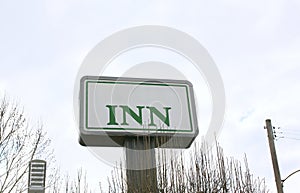 Inn and Suites Sign photo