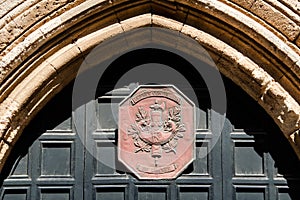 Inn of the Tongue of France, emblem on the entrance door, Avenue of the Knights, Old Town of Rhodes, Greece