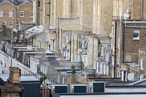 Inner city London town housing. Packed backstreet building roof tops photo