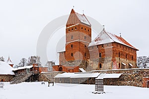 Inner courtyard of historical stone castle in winter, Trakai, Lithuania.