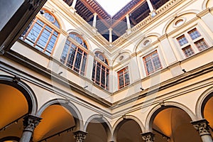 Inner courtyard of the Palazzo Strozzi, a significant historical edifice in Florence, Italy