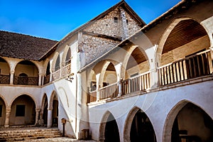 Inner courtyard of the Timios Stavros Monastery in Omodos village. Limassol Distric, Cyprus photo