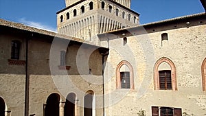 The inner courtyard of Torrechiara Castle, Parma, Italy, on a sunny day