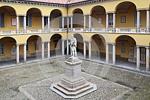 Inner courtyard of the University of Pavia with monument to Alessandro Volta Cortile Voltiano, Italy photo
