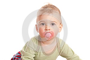 Innocence boy with a baby's dummy