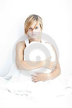 Innocent young woman in a white linen