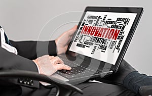 Innovation word cloud concept on a laptop