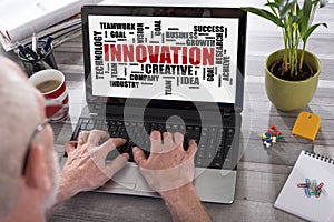 Innovation word cloud concept on a laptop screen